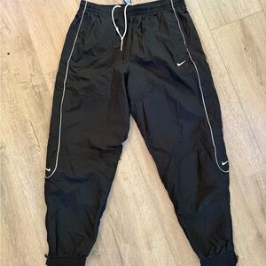 Nike Black Sweatpants with Elastic Waistband and Cuffed Ankles